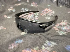 Shadow sunglasses resting on floral fabric